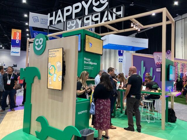 Happy Co trade show booth at Apartmentalize 2022