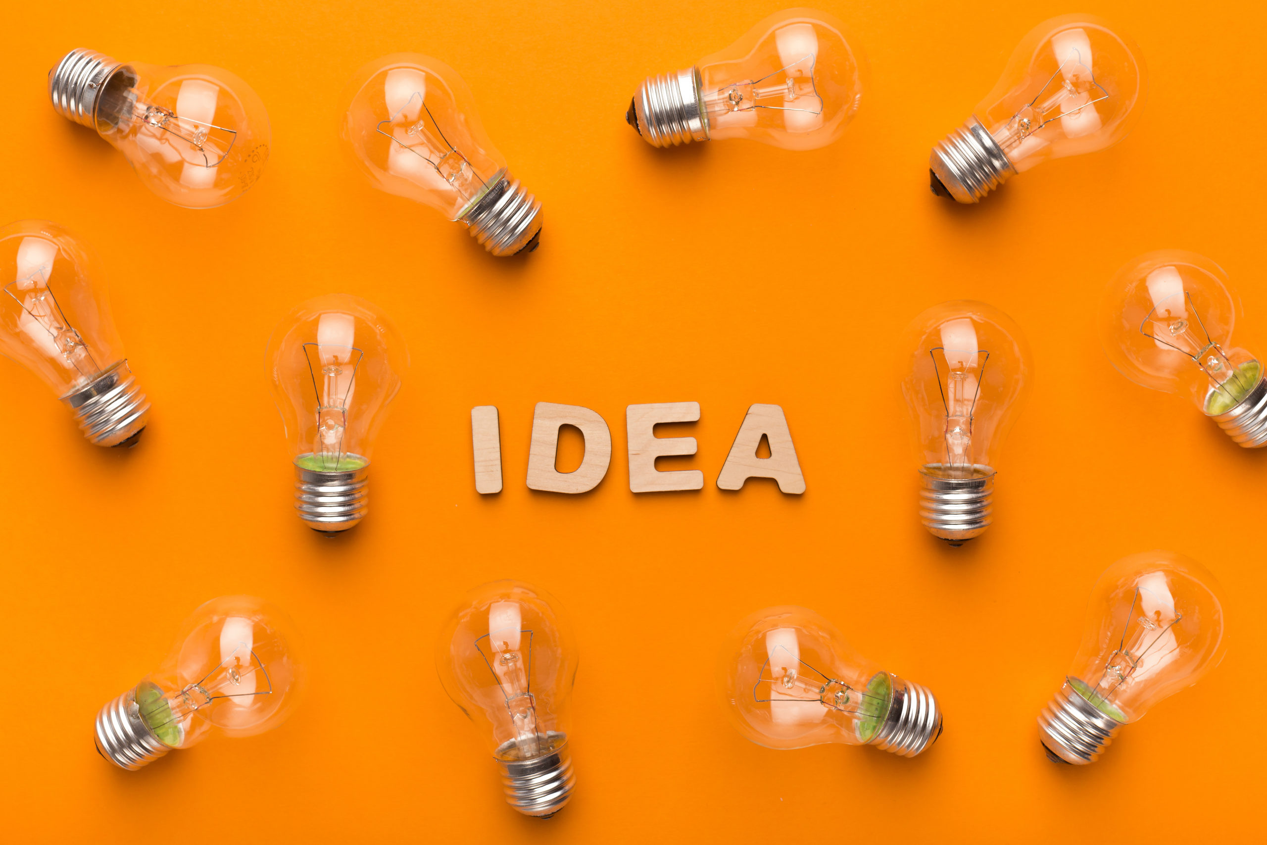 “Ideas” word art with light bulb images
