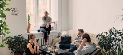 people in multifamily apartment living room