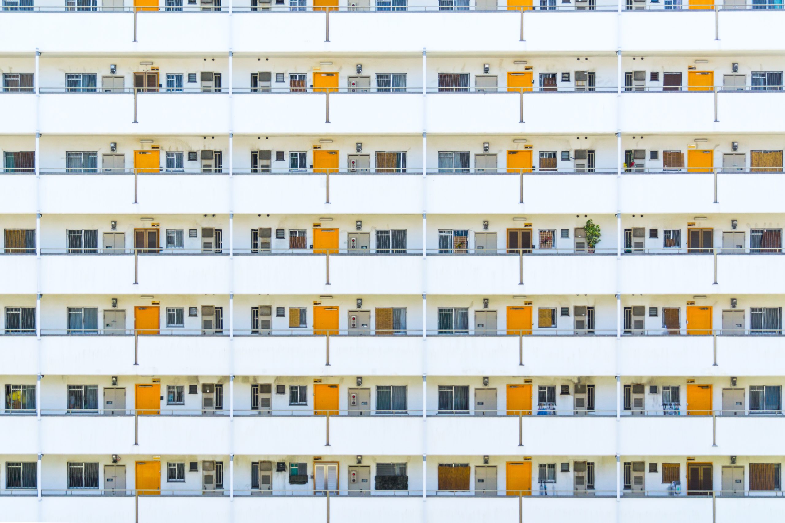 yellow and white apartment complex in Osaka, Japan