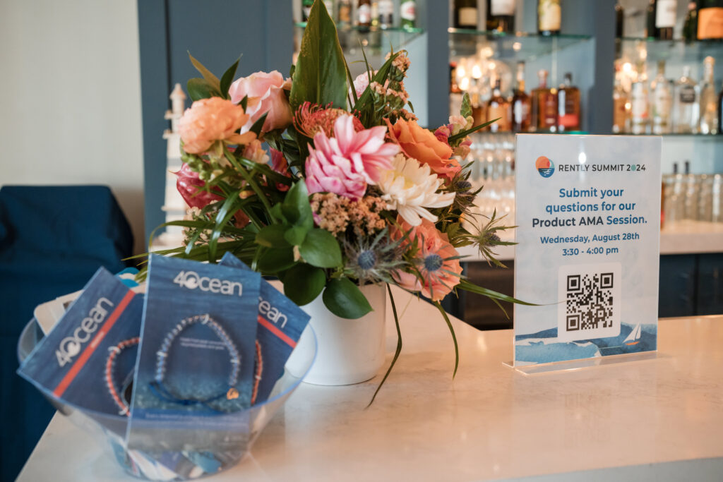 Rently summit and 4ocean partnership bracelet sits on a tabletop