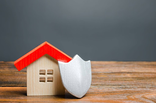 Little wooden house and shield