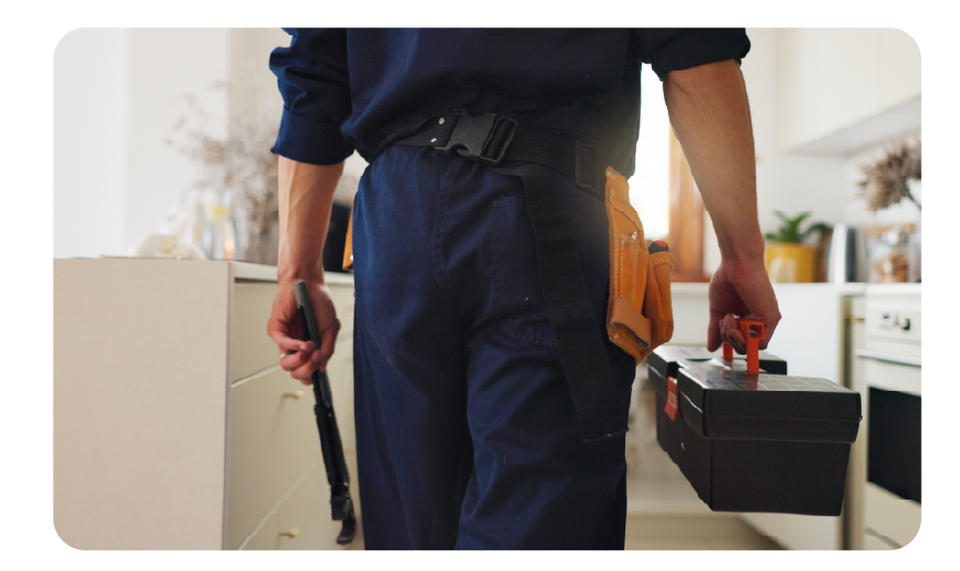 Maintenance worker entering a unit